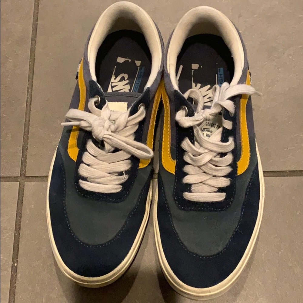 Blue and yellow vans
